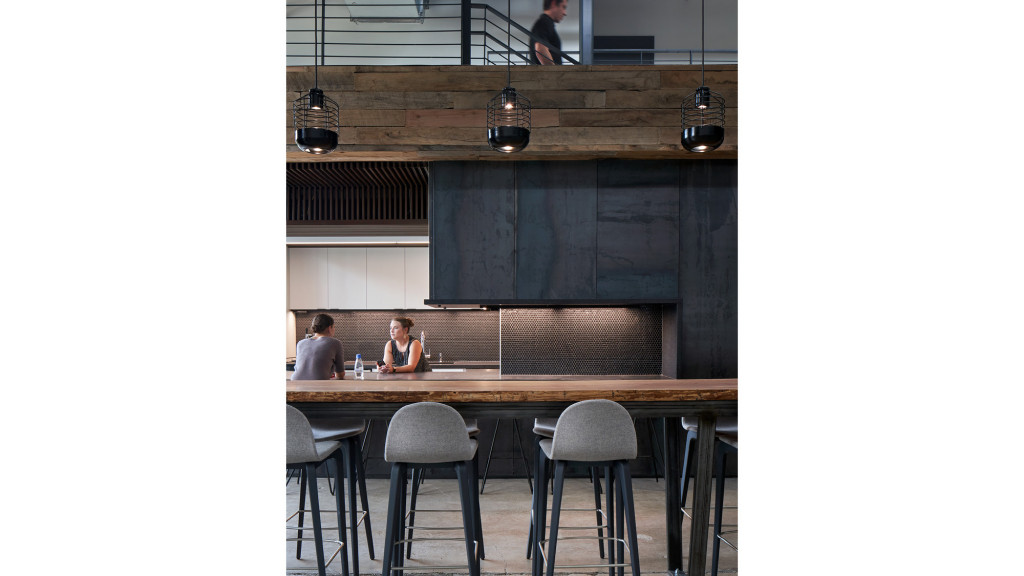 A few people sitting at a table.